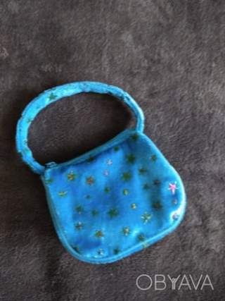 Маленька бархатна з сяючими зірками сумка