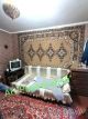 Здається затишна простора кімната в цегл.будинку