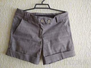 Жіночі короткі шорти в клітинку, Італія