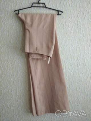 Жіночі широкі штани брюки в полоску, розширені до низу, р.38