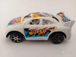 Іграшка машинка біла