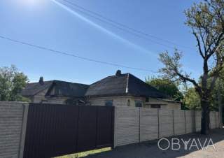 Цегляний будинок в центрі Раківки